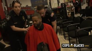 Female police officers hide this young black man in a barbershop