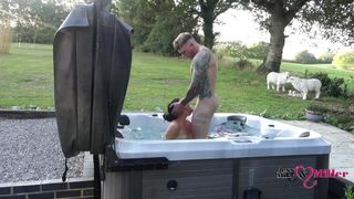 passionate outdoor sex in charming tub on nasty weekend away