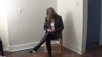Biker Chick Salem Smokes in Black Leather and a White Tank Top