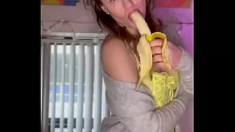 Hungry alluring MILF eating a banana
