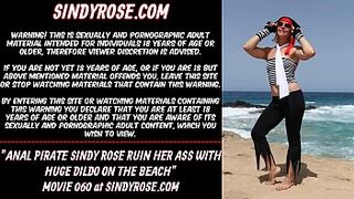 Anal pirate Sindy Rose ruin her rear-end with big dildo on the beach